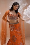 PARUL GANDHI_Orange Net Hand Embroidered Floral Motifs Round Mermaid Lehenga Set_at_Aza_Fashions