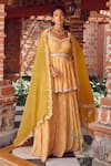 Buy_RITIKA VERMA_Yellow Peplum Top And Sharara Georgette Embroidered Patra Cutdana Aamira Set _at_Aza_Fashions