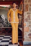 Buy_RITIKA VERMA_Yellow Georgette Embroidered Sequin V-neck Rabia Jacket With Bell Pant _at_Aza_Fashions