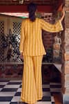 Shop_RITIKA VERMA_Yellow Georgette Embroidered Sequin V-neck Rabia Jacket With Bell Pant _at_Aza_Fashions