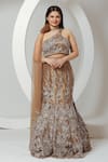 Buy_Ellemora fashions_Gold Net Embroidered Sequins One Shoulder Fishcut Lehenga Set_at_Aza_Fashions