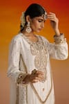 OHH CROW_Ivory Crepe Hand Embroidered Sequins Round Paisley Motif Kurta Pant Set _Online_at_Aza_Fashions