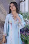 Myra Clothing Line_Blue Chanderi Hand Embroidered Resham V-neck Floral Work Kurta With Pant _Online_at_Aza_Fashions