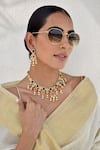 Buy_Swabhimann_Multi Color Diamonds, Carved Floret Pattern Kundan Embellished Necklace Set _at_Aza_Fashions