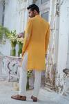 Amrit Dawani_Yellow Muslin Embroidery Royal Peacock Kurta With Trouser_Online_at_Aza_Fashions