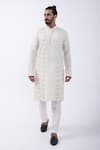 Buy_KAKA CALCUTTA_Ivory Kurta Bam Silk Embellished Mirrorwork Wave With Pyjama _at_Aza_Fashions