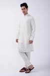 Buy_KAKA CALCUTTA_Ivory Kurta Bam Silk Embellished Mirrorwork Hem With Pyjama _at_Aza_Fashions