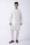 Buy_KAKA CALCUTTA_Ivory Kurta Bam Silk Embellished Mirrorwork Hem With Pyjama _Online_at_Aza_Fashions