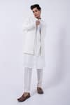 Buy_KAKA CALCUTTA_Ivory Suiting Embroidered Cutdana Jacket _at_Aza_Fashions