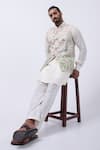 KAKA CALCUTTA_Ivory Suiting Embroidered Thread Bundi Jacket _at_Aza_Fashions