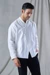 Bhusattva_White Organic Linen Overlapping Loop Button Jacket _at_Aza_Fashions