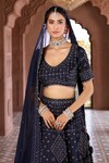 Shop_Aariyana Couture_Blue Lehenga And Blouse Silk Chanderi Embroidered Thread Paan Neck Shimmer Set_at_Aza_Fashions