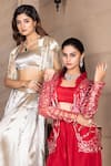 Tarisha Tholia_Red Semi Silk Hand Embroidered Cutdana Jacket Ruffled Neck Aura Sharara Set _Online_at_Aza_Fashions