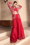 Buy_Tarisha Tholia_Red Semi Silk Hand Embroidered Cutdana Jacket Ruffled Neck Aura Sharara Set _at_Aza_Fashions