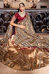 Shop_Tarisha Tholia_Gold Tissue Hand Embroidered Zardosi V Neck Azhar Blouse Lehenga Set _at_Aza_Fashions