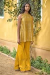 Buy_Tarisha Tholia_Yellow Tissue Hand Embroidered Thread Cutwork Kurta Round Diane Pant Set _at_Aza_Fashions