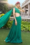 Shop_Tarisha Tholia_Green Semi Silk Solid One Shoulder Kai Draped Gown _at_Aza_Fashions