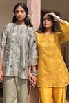 Buy_Tarisha Tholia_Yellow Organza Hand Embroidered Thread Cutwork Round Marigold Kurta Set _Online_at_Aza_Fashions