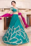 Buy_Tarisha Tholia_Green Organza Hand Embroidered Zardosi V Neck Vasara Lehenga Set _at_Aza_Fashions