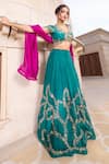 Shop_Tarisha Tholia_Green Organza Hand Embroidered Zardosi V Neck Vasara Lehenga Set _at_Aza_Fashions