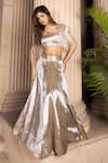 Buy_Tarisha Tholia_Silver Brocade Hand Embroidered Cutdana Square Neck Zia Short Cape Lehenga Set _at_Aza_Fashions