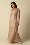 Buy_RAISHMA_Beige Tulle Embroidered Sequin Round Jenna Linear Gown _at_Aza_Fashions