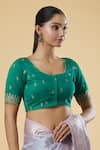 Samyukta Singhania_Green Dupion Silk Embroidered Sequins U Neck Floral Motif Blouse _Online_at_Aza_Fashions