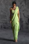 Buy_Manika Nanda_Green Raw Silk Embroidery Tassel Embellished Border Pre-draped Saree With Blouse _at_Aza_Fashions