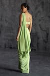 Shop_Manika Nanda_Green Raw Silk Embroidery Tassel Embellished Border Pre-draped Saree With Blouse _at_Aza_Fashions