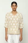 Abraham & Thakore_Beige 100% Cottopn Compact Voile V Neck Ottoman Moon Pattern Top _Online_at_Aza_Fashions