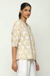 Shop_Abraham & Thakore_Beige 100% Cottopn Compact Voile V Neck Ottoman Moon Pattern Top _Online_at_Aza_Fashions