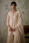 Kritika Dawar_Ivory Chanderi Embroidered Floral Notched Short Kurta Gharara Set _at_Aza_Fashions