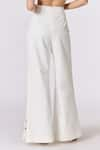 Shop_S&N by Shantnu Nikhil_Off White Denim Placement Embellishments Gold Buttons Flared Trouser _Online_at_Aza_Fashions