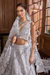 Seema Gujral_Silver Net Crystals, Sequins, Embroidery Metallic Flower Bridal Lehenga Set_Online_at_Aza_Fashions