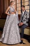Seema Gujral_Silver Net Crystals, Sequins, Embroidery Metallic Flower Bridal Lehenga Set_at_Aza_Fashions