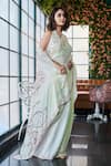 Shop_SAYISHA_Cream Chinon Embroidered Floral Halter Neck Hem Saree With Blouse _Online_at_Aza_Fashions