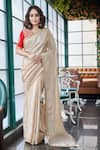 Buy_SAYISHA_Gold Tissue Silk Embroidered Floral V Neck Scallop Hem Saree With Blouse _at_Aza_Fashions