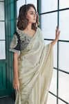 SAYISHA_Beige Tissue Silk Embroidered Floral V Neck Scallop Hem Saree With Blouse _at_Aza_Fashions