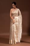 Buy_Sacred Weaves_Beige Tissue Silk Zari Stripe Pattern Saree With Unstitched Blouse Piece _at_Aza_Fashions