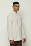 Buy_ABRAHAM AND THAKORE_Off White Cotton Printed Broken Pinstripes Motif Short Kurta _Online_at_Aza_Fashions