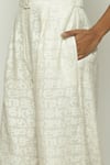 Abraham & Thakore_Ivory Chanderi Calligraphy Cutwork Pattern Trouser _at_Aza_Fashions