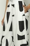 Abraham & Thakore_White Tencel Calligraphy Pattern Trouser _at_Aza_Fashions