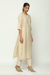 Buy_ABRAHAM AND THAKORE_Beige Chanderi Calligraphy Round Neck Cutwork A Line Kurta _Online_at_Aza_Fashions