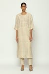 Buy_ABRAHAM AND THAKORE_Beige Chanderi Calligraphy Round Neck Cutwork A Line Kurta 