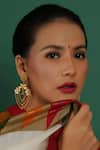 Buy_Ruby Raang_Gold Plated Peacock Motif Carved Layered Earrings _at_Aza_Fashions