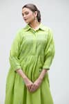 Ibai_Green Handwoven Jamdani Muslin Bird Motifs Collar Barbet Smocked Dress _at_Aza_Fashions