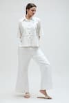 Shop_Ibai_White Handwoven Pure Cotton Solid Dove Flared Pant _at_Aza_Fashions