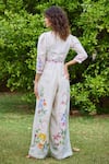 Pozruh by Aiman_Off White Linen Print Floral V-neck Laguna Cross Jumpsuit _Online_at_Aza_Fashions