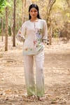 Buy_Pozruh by Aiman_Off White Linen Print Floral Round Neck Aruba Front Pleat Top _at_Aza_Fashions