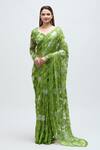 Buy_Nakita Singh_Green Net Embroidered Sequin Leaf Neck Saree With Blouse _at_Aza_Fashions